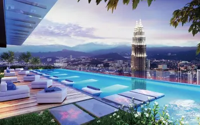 a pool with a view of a city at Klcc suites at star - 2 bedroom in Kuala Lumpur
