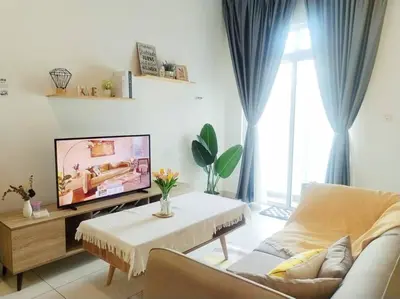 a living room with a couch and a tv at PWTC Titiwangsa HKL near MRT family in Kuala Lumpur
