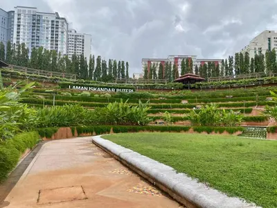 a park in a city with trees and buildings at KL Panorama View City in Kuala Lumpur