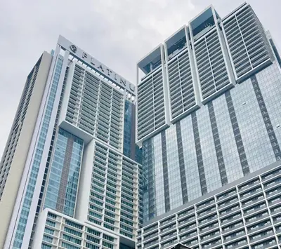 two tall skyscrapers in a city at Platinum KLCC & Bukit Bintang in Kuala Lumpur