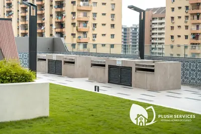 a view of a building with grass and buildings at Sentral Suites by Plush in Kuala Lumpur