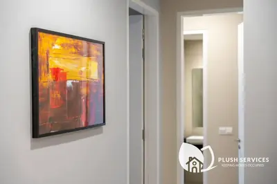 a painting hanging on a wall in a room at Sentral Suites by Plush in Kuala Lumpur