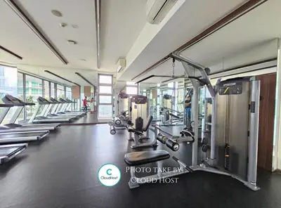 a gym with treadmills and machines in a building at The Robertson Bukit Bintang Kuala Lumpur by Cloud Host in Kuala Lumpur