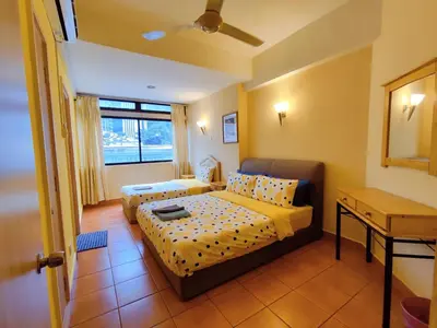 a hotel room with two beds and a window at Fahrenheit Pavillion Bukit Bintang By JS-Home in Kuala Lumpur