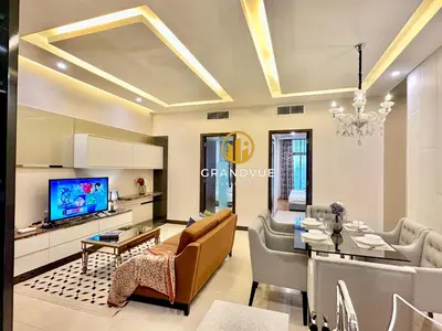 a living room with a couch and a table at Dorsett Residence Bukit Bintang 3MinsTo Pavilion By HeyStay Management in Kuala Lumpur