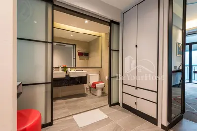 a bathroom with a toilet and a sink at Maison 101 Dang Wangi Kuala Lumpur KLCC in Kuala Lumpur