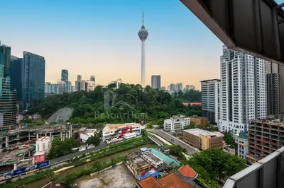 a view of a city with the cn tower in the background at Maison 101 Dang Wangi Kuala Lumpur KLCC in Kuala Lumpur
