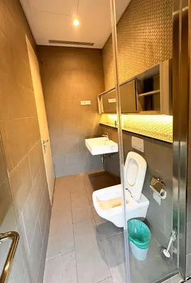 a bathroom with a toilet and a sink at Lucentia Residence by EAS Maju property in Kuala Lumpur