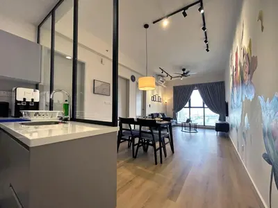a kitchen and dining room with a dining table at Trion KL High floor Corner Unit Free Parking Near TRX KL Centre and MRT in Kuala Lumpur