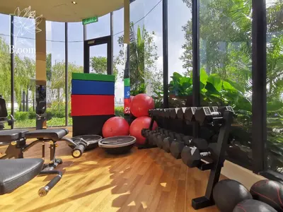 a gym with a bunch of equipment in a room at Trion KL High floor Corner Unit Free Parking Near TRX KL Centre and MRT in Kuala Lumpur
