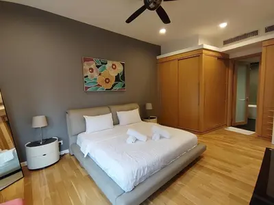 a bedroom with a white bed with a ceiling fan at Stylish Large 3guests 1br St Mary Residences in Kuala Lumpur