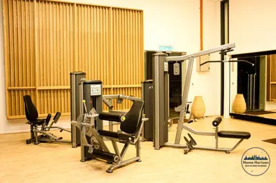 a gym with cardio equipment and treadmills at LUCENTIA RESIDENCE BY HOME HORIZON in Kuala Lumpur