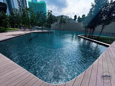 a swimming pool in the middle of a city at LUCENTIA RESIDENCE BY HOME HORIZON in Kuala Lumpur