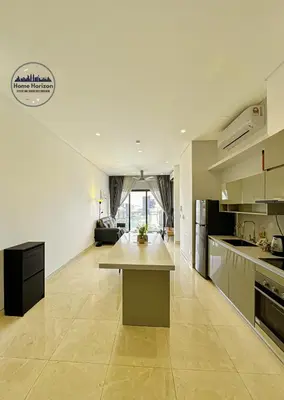 a large kitchen with a large island in the middle at LUCENTIA RESIDENCE BY HOME HORIZON in Kuala Lumpur