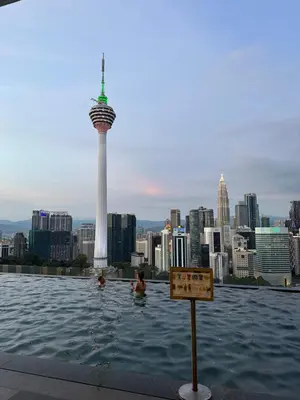 a swimming pool with a view of a city at Ceylonz Suites Bukit Bintang by KL ONE in Kuala Lumpur