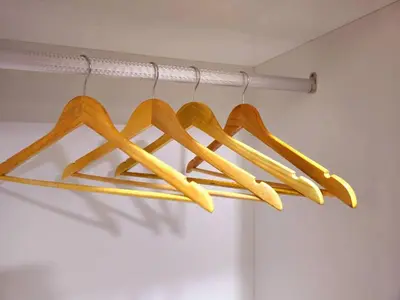 a bunch of woodensticks hanging on a rack at Wisma Infinitum Studio 5\u5206\u949f\u62b5\u8fbe KL \u5e02\u4e2d\u5fc3 in Kuala Lumpur
