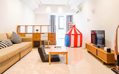 a living room with a couch and a tv at VIVO at 9 Seputeh by Airhost in Kuala Lumpur