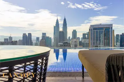a view of the city from the rooftop of a building at The Luxe & The Colony, KLCC in Kuala Lumpur