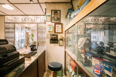 a shop with a display case in a store at Gold3 Boutique Hotel in Kuala Lumpur