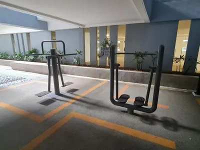 a empty parking lot with a bike rack in a building at Blue Small Studio Near KLCC in Kuala Lumpur