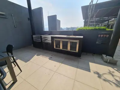a balcony with an air conditioner on top of a building at Blue Small Studio Near KLCC in Kuala Lumpur