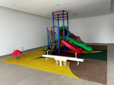 a childrens play room with a playground at Private Jacuzzi Suite - Pertama Residency in Kuala Lumpur