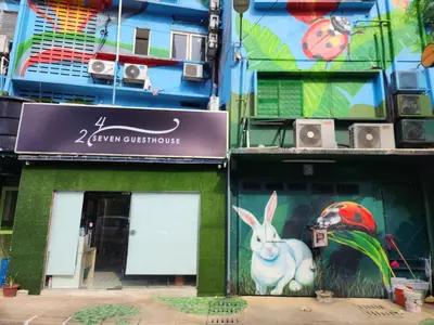 a building with a mural of a rabbit on it at 24Seven Guesthouse in Kuala Lumpur