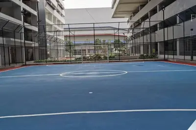 a basketball court in a building with a basketball hoop at M Vertica Residences@KL in Kuala Lumpur