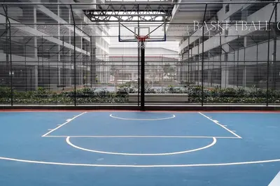 a basketball court with a hoop in a building at M Vertica Residences@KL in Kuala Lumpur