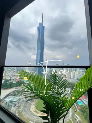 a view of the burj khalifa from a window at Face Malaysia Tallest Tower 118 in Kuala Lumpur in Kuala Lumpur