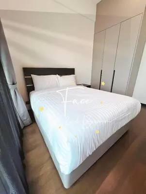 a bed with writing on it in a bedroom at Face Malaysia Tallest Tower 118 in Kuala Lumpur in Kuala Lumpur