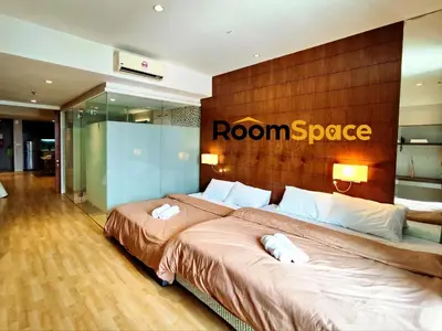 a bedroom with two beds with a room space sign on the wall at D'Majestic Place Jalan Pudu in Kuala Lumpur