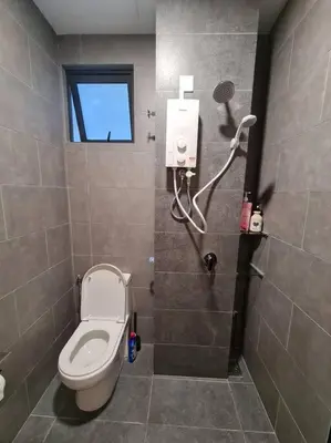 a bathroom with a toilet and a shower with a window at KL Creamy Tiny 2R1B Home \u7206\u6b3e\u5976\u6cb9\u98ce\u5c0f\u5b85 in Kuala Lumpur