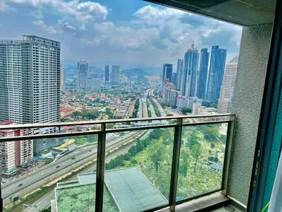 a view of a city from a window in a building at Summer suites victory house in Kuala Lumpur