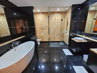 a bathroom with a large tub and a shower at Luxurious Apartment St Mary Residences Resort Style in Kuala Lumpur