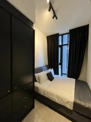 a bedroom with a bed and a large window at Bukit Bintang Axon Residences 3R2B 3Queens Beds in Kuala Lumpur