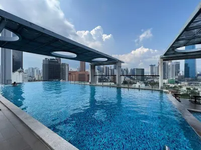 a large swimming pool on top of a building at D'Majestic Kuala Lumpur By Luxe Home in Kuala Lumpur