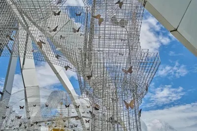 a large metal structure with birds on it at Arte Mont Kiara Free Parking, Kuala Lumpur in Kuala Lumpur