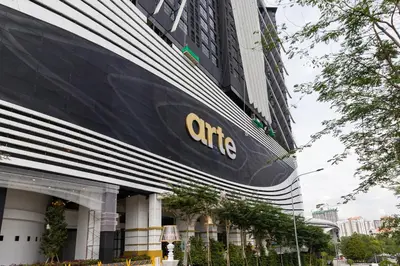 a large building with the cairns logo on it at Arena Gaming Suite In Arte Mont Kiara in Kuala Lumpur