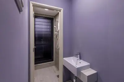 a bathroom with a sink and a shower at Arena Gaming Suite In Arte Mont Kiara in Kuala Lumpur