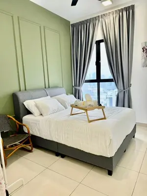 a bedroom with a large bed with a window at 3R3B KLCity CentreView (Balcony) - 8 pax in Kuala Lumpur