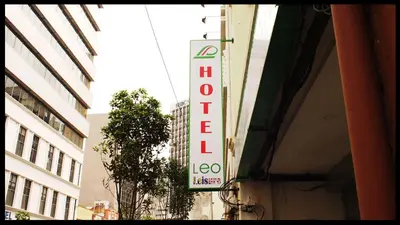 a sign for a hotel on the side of a building at Leo Leisure Hotel @ Central Market in Kuala Lumpur