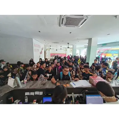 a large group of people sitting in a room at Sakura Elite Kuala Lumpur in Kuala Lumpur