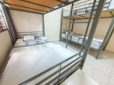 a room with two bunk beds in it at Cozy Place-Rumah Nyaman - Bukit Bintang by Shine Stay in Kuala Lumpur