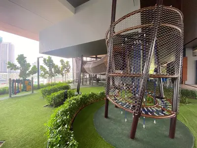 a playground in a building with a spiral staircase at The Axon Bukit Bintang Residence by De Space in Kuala Lumpur