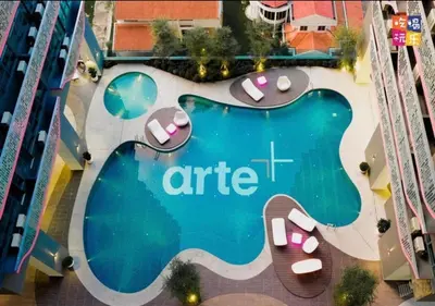 an overhead view of a hotel swimming pool with aire sign at FHS Homestay @ Arte Plus Jalan Ampang T1-40-02 in Kuala Lumpur