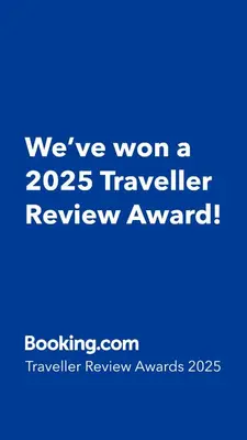a blue sign that says weve won a traveler review award at OOAK Residence at Mont Kiara in Kuala Lumpur