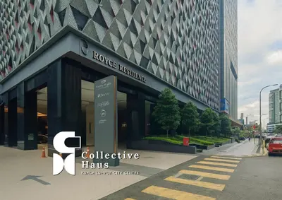 a building with a sign in front of it at Royce Residence KLCC Kuala Lumpur by Collective Haus in Kuala Lumpur
