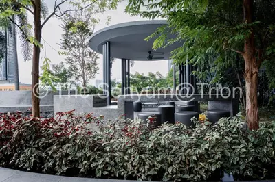 a group of plants in front of a building at TRION Studio 4 PAX Teneighth in Kuala Lumpur