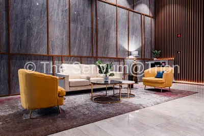 a living room with a couch and two chairs and a table at TRION studio 4 PAX tenseven in Kuala Lumpur
